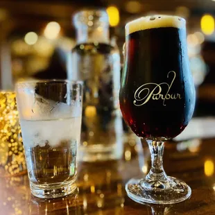 a glass of beer and a glass of water