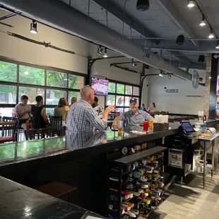 people sitting at the bar