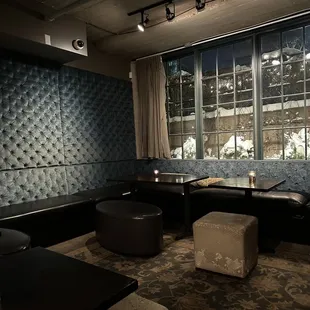 a room with couches and tables