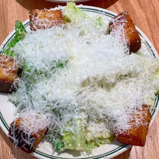 The Signature Caesar baby gem lettuce, caesar dressing, garlic butter croutons, parmesan cheese