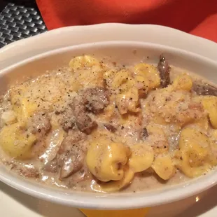 Ravioli w/ ricotta cheese in truffle, mushroom cream sauce. A special/off the menu item.