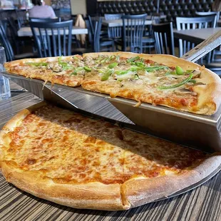 Half and half - chess pizza at the bottom top was Italian sausage, mushroom, bell peppers