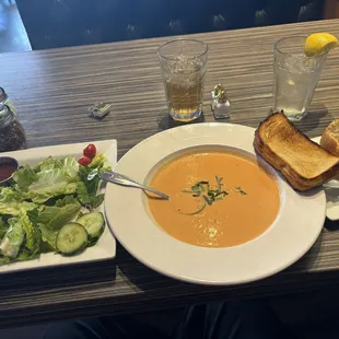Tomato and basil soup, grilled cheese, house salad and bread and butter
