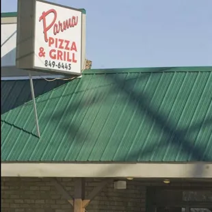 a pizza and grill sign