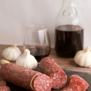 a glass of wine and garlic