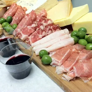 Meats and homemade wine from Parma Sausage, cheese &amp; olives from Penn Mac