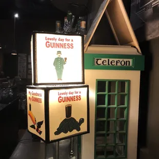 a phone booth and a lamp