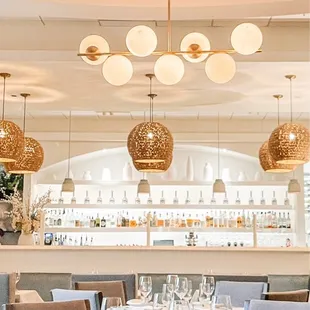 a dining room with tables and chairs