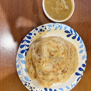 a plate of food and a bowl of soup