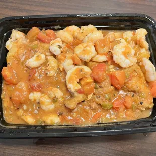 Catfish Lorell  (Catfish over rice with shrimp on top.)