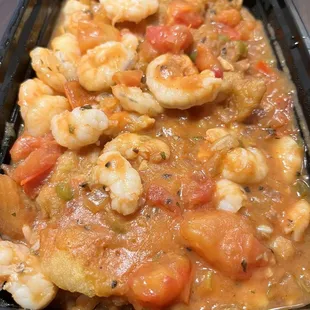 Catfish Lorell  (Catfish over rice with shrimp on top.)