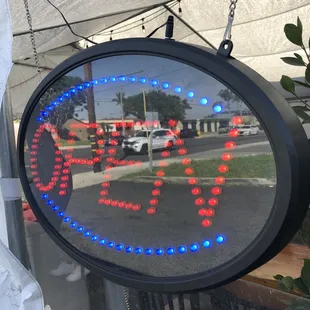 a reflection of a police car in a mirror