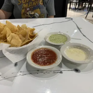 Complimentary chips with salsa &amp; cheese dip