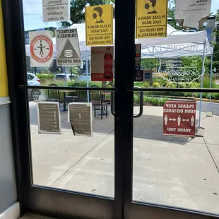 a view of a restaurant through a window
