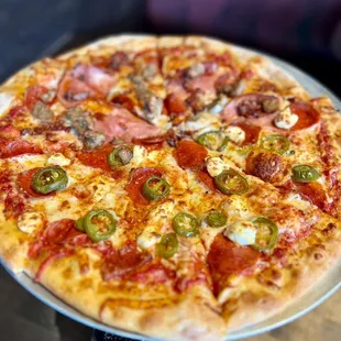 14" pizza. Half Uncle Sam, half I Love Meat