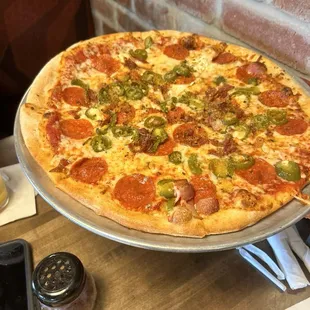 Build your own pizza: pepperoni, bacon, pickled jalapeños, ricotta, and parmesan mix.