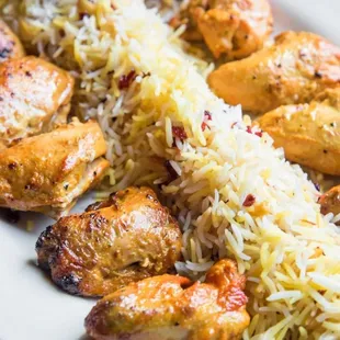 a plate of chicken and rice