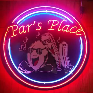 a neon sign for a bar