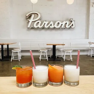 L to R: Pineapple Punch, Mr. Coconut, Negroni Slushy, Mr. Coconut