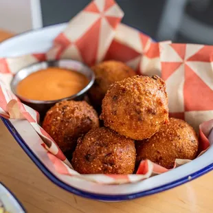 a basket of fried chicken nuggies