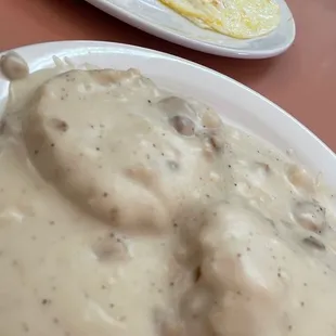 Biscuits and Gravy (chicken fried steak and eggs hanging out in the back)