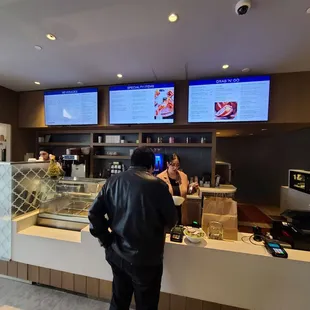 a man standing in front of a counter