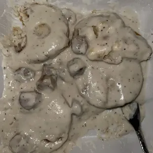 That is supposedly sausage gravy and biscuits. Ew. Tastes even worse than it looks.
