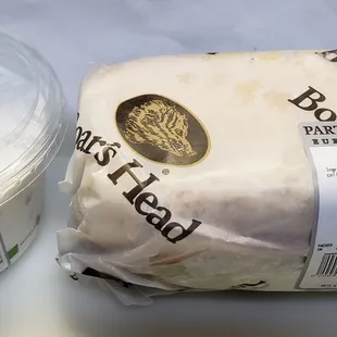 The Italian Grinder is as tall as the medium container.