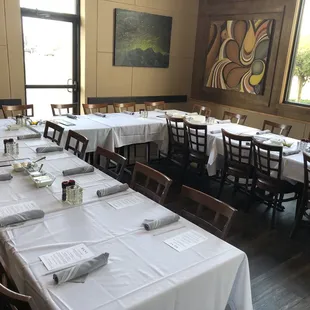 Private dinner setup (with tablecloths) - We printed these menus for our party.