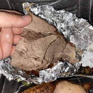 Got the partners plate at the Kenedy partners. Guess this is supposed to be brisket. No smoke ring and no flavor. Tastes like bland roast.