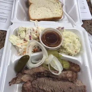 pulled pork, coleslaw, coleslaw, and bread