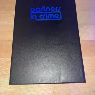 a black book with blue lettering