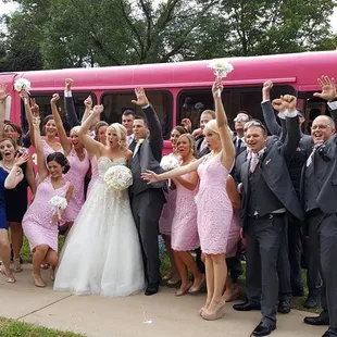 Great looking wedding group on our Pink Diamond Party Bus!