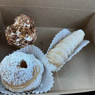 a variety of pastries in a box