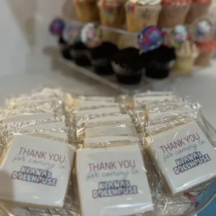 a tray of thank you cupcakes