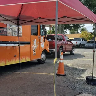 a taco truck parked in a parking lot