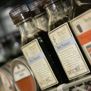a shelf of jars of liquor