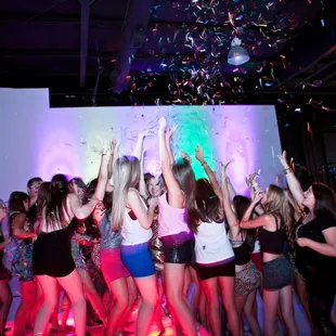 Confetti canon celebration with LED dance floor and up-lighting
