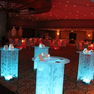 Customized LED logo tables (logo on top) for corporate event.