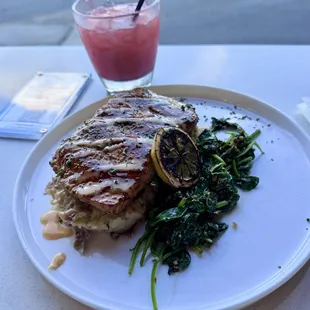 Honey glazed salmon over potatoes and spinach