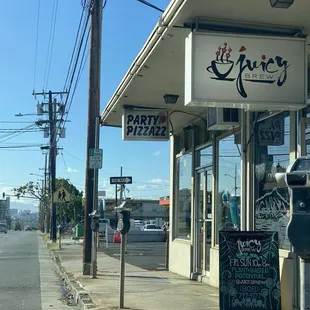 Right before Ace Hardware, on street parking...