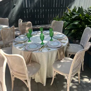 Custom linens, specialty dinnerware, Emma Chairs