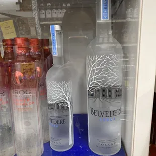 bottles of vodka on display in a store