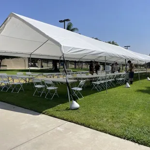 Three 20x40 canopies and tables/chairs for 240 people