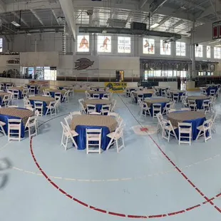 45 round tables and 360 premium white resin chairs for a nonprofit event
