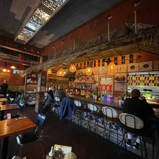 Bar seating plus lots of tables