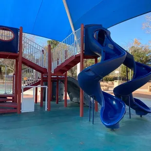 Part of the large playground, covered from the sun.
