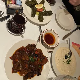 Grape leaves, eggplant with sauce, hummus