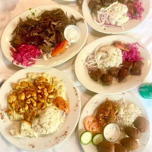 ali nazik with chicken, shawarma kebab, lamb shish kebab, and falafel plate