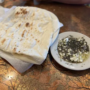 Complimentary flat bread and oil